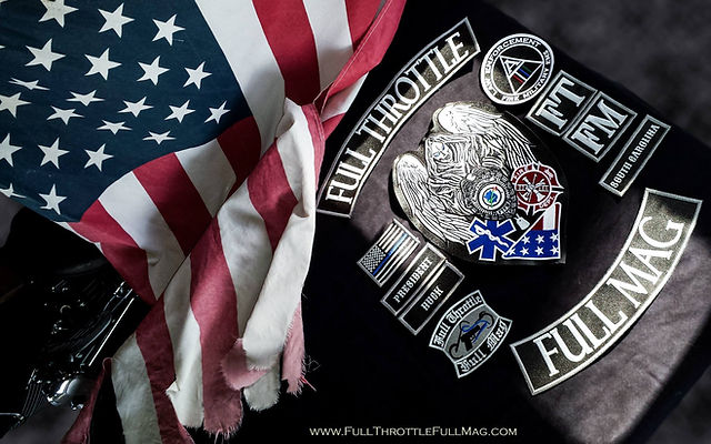 FTFM vest laid flat over American flag